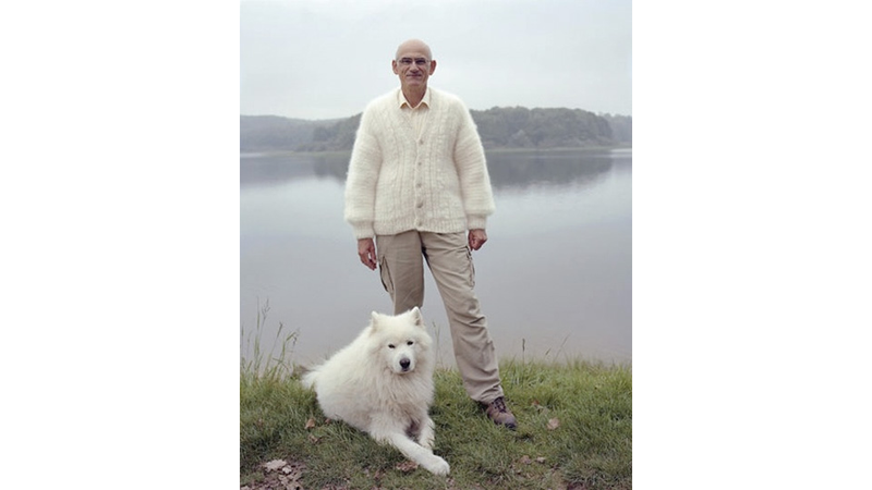 Illustration for article titled See My Vest: Portraits of Pet Owners in Dog Hair Sweaters